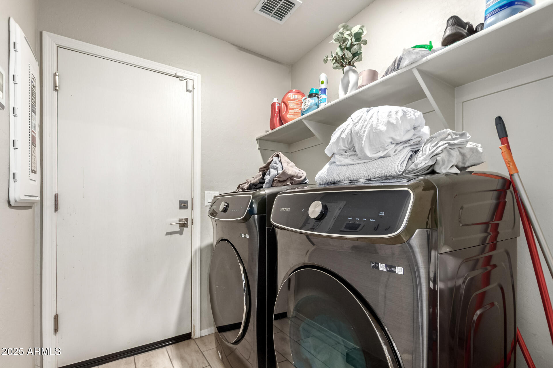 1133 South Rico Mesa, AZ 85204 - Photo 29 of 36 a utility room with dryer and washer