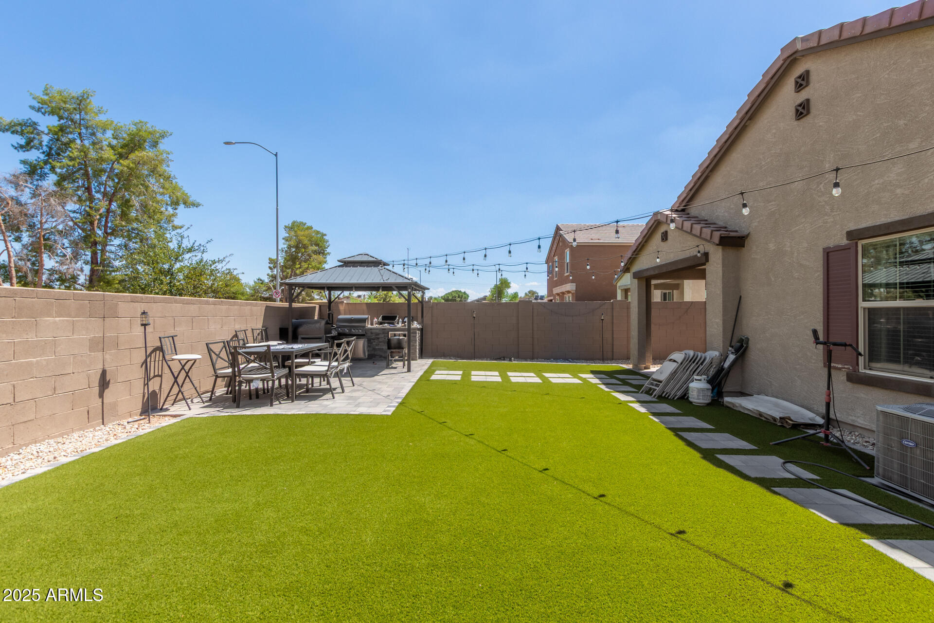 1133 South Rico Mesa, AZ 85204 - Photo 31 of 36 a view of a backyard with sitting area