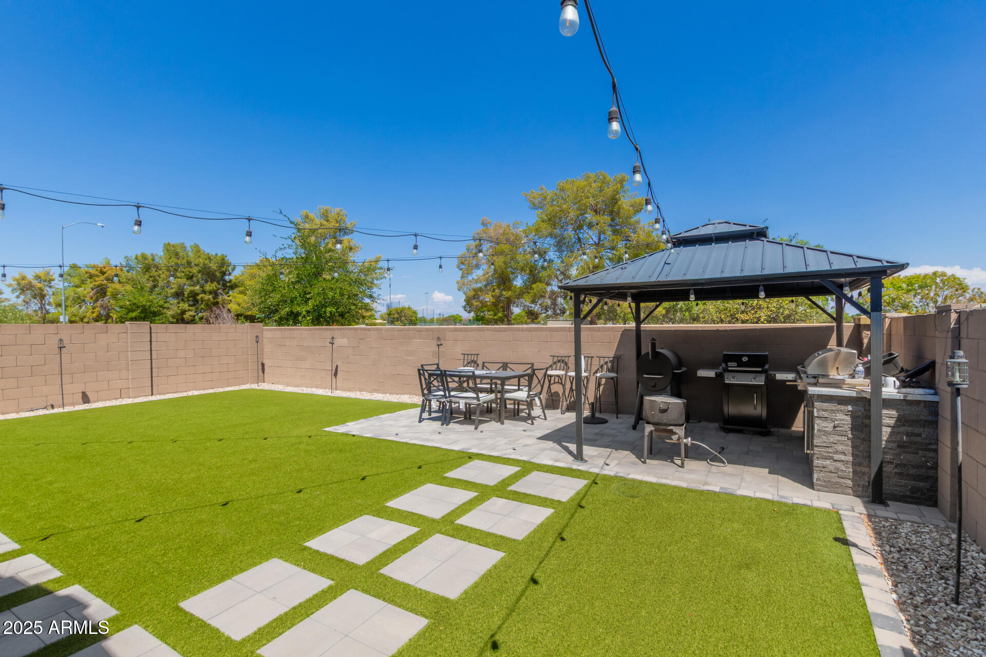 1133 South Rico Mesa, AZ 85204 - Photo 32 of 36 a view of swimming pool with outdoor seating
