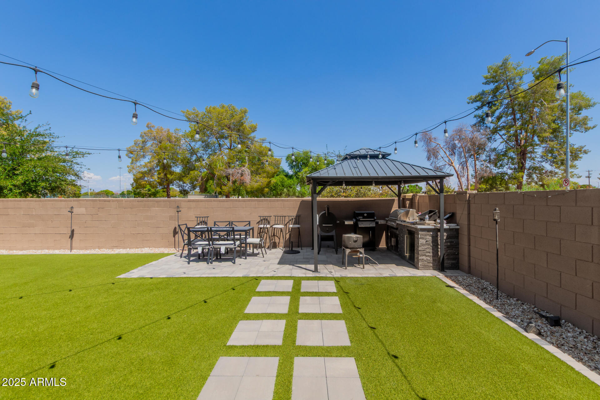 1133 South Rico Mesa, AZ 85204 - Photo 33 of 36 a view of swimming pool with outdoor seating and plants