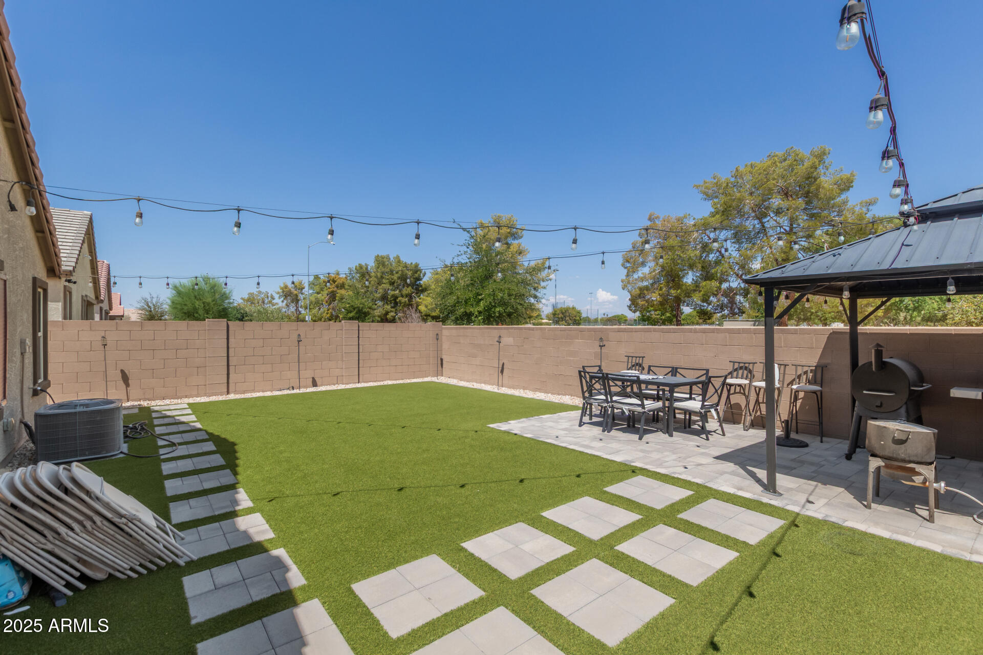 1133 South Rico Mesa, AZ 85204 - Photo 34 of 36 a view of a backyard with sitting area