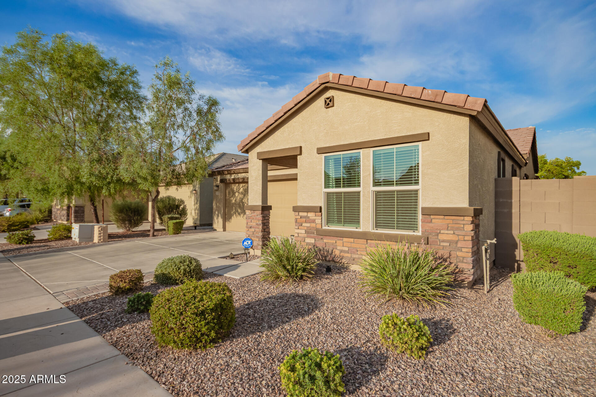 1133 South Rico Mesa, AZ 85204 - Photo 5 of 36 a front view of a house with a yard