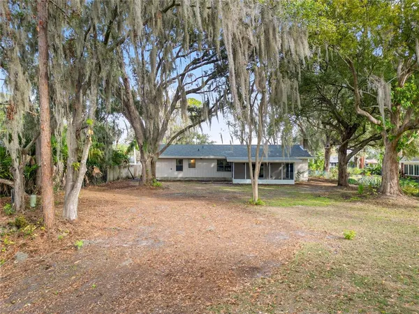 a house with trees in front of it