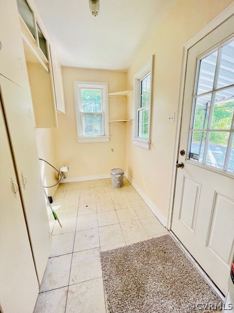 3701 Charles City Road Henrico, VA 23231 - Photo 10 of 23 HUGE Laundry/Utility Room ... door to Side Porch. Includes Built-ins and Shelving