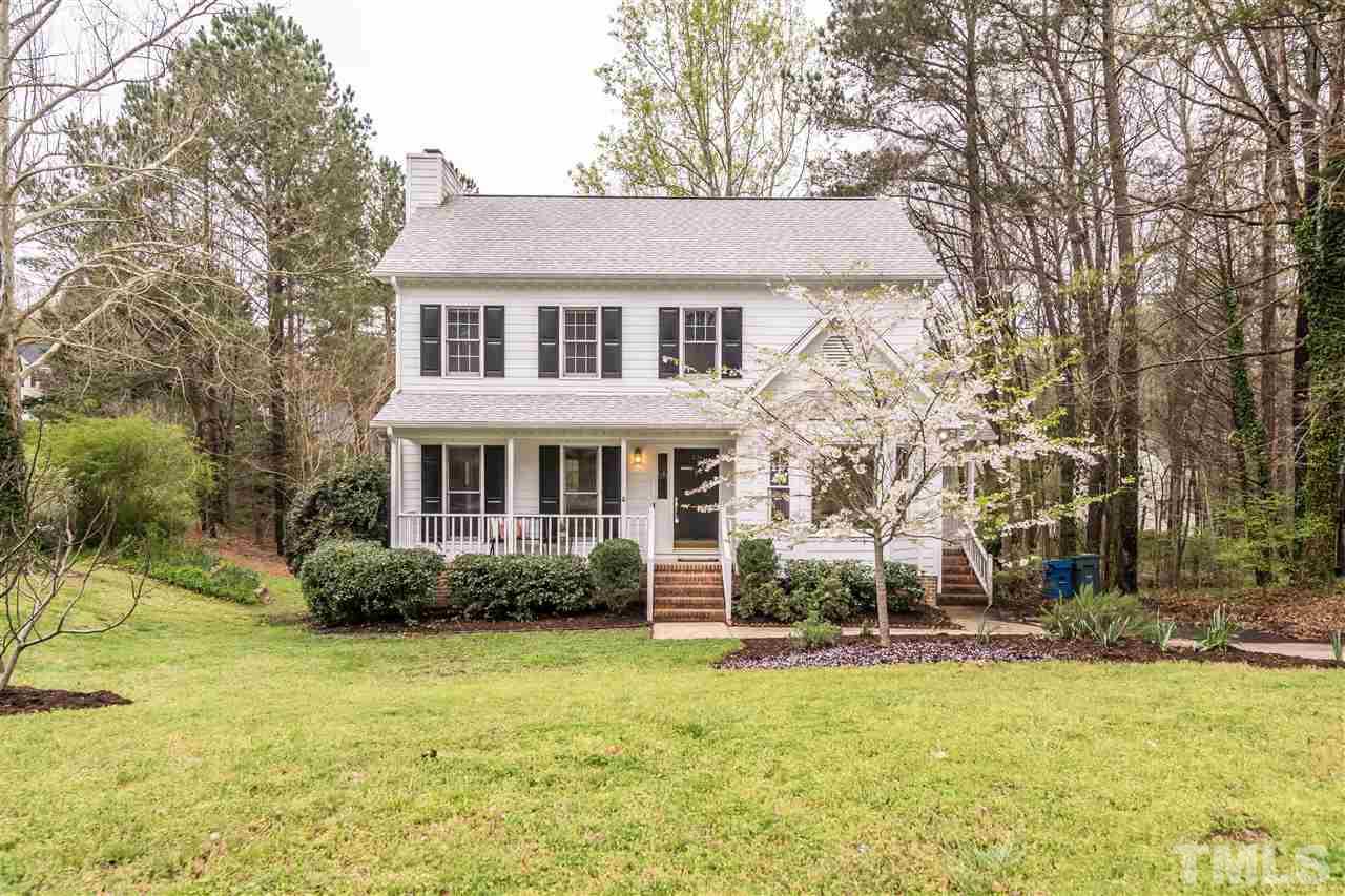 1 Swallows Ridge Court Durham, NC 27713 - Photo 1 of 26 a front view of a house with garden
