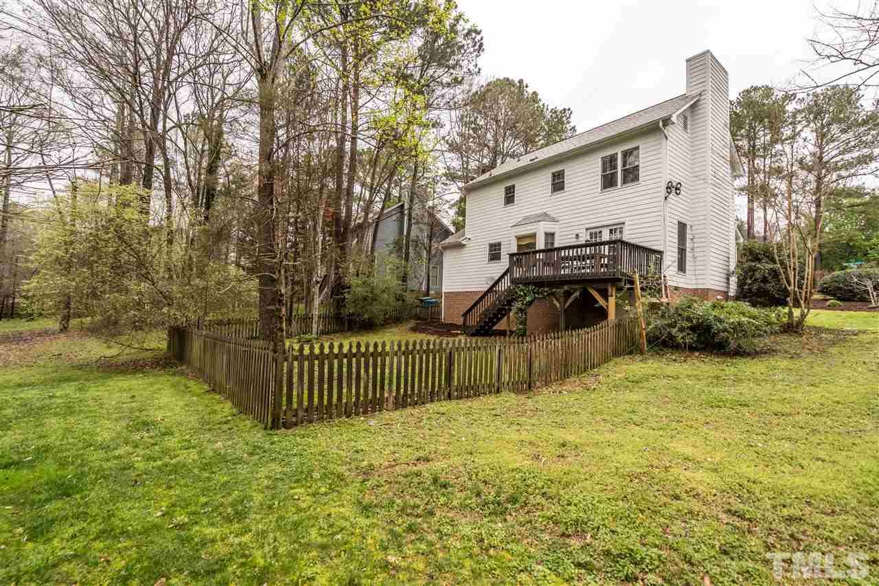 1 Swallows Ridge Court Durham, NC 27713 - Photo 24 of 26 a view of a house with backyard and sitting area