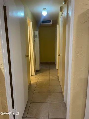 a view of hallway with shower