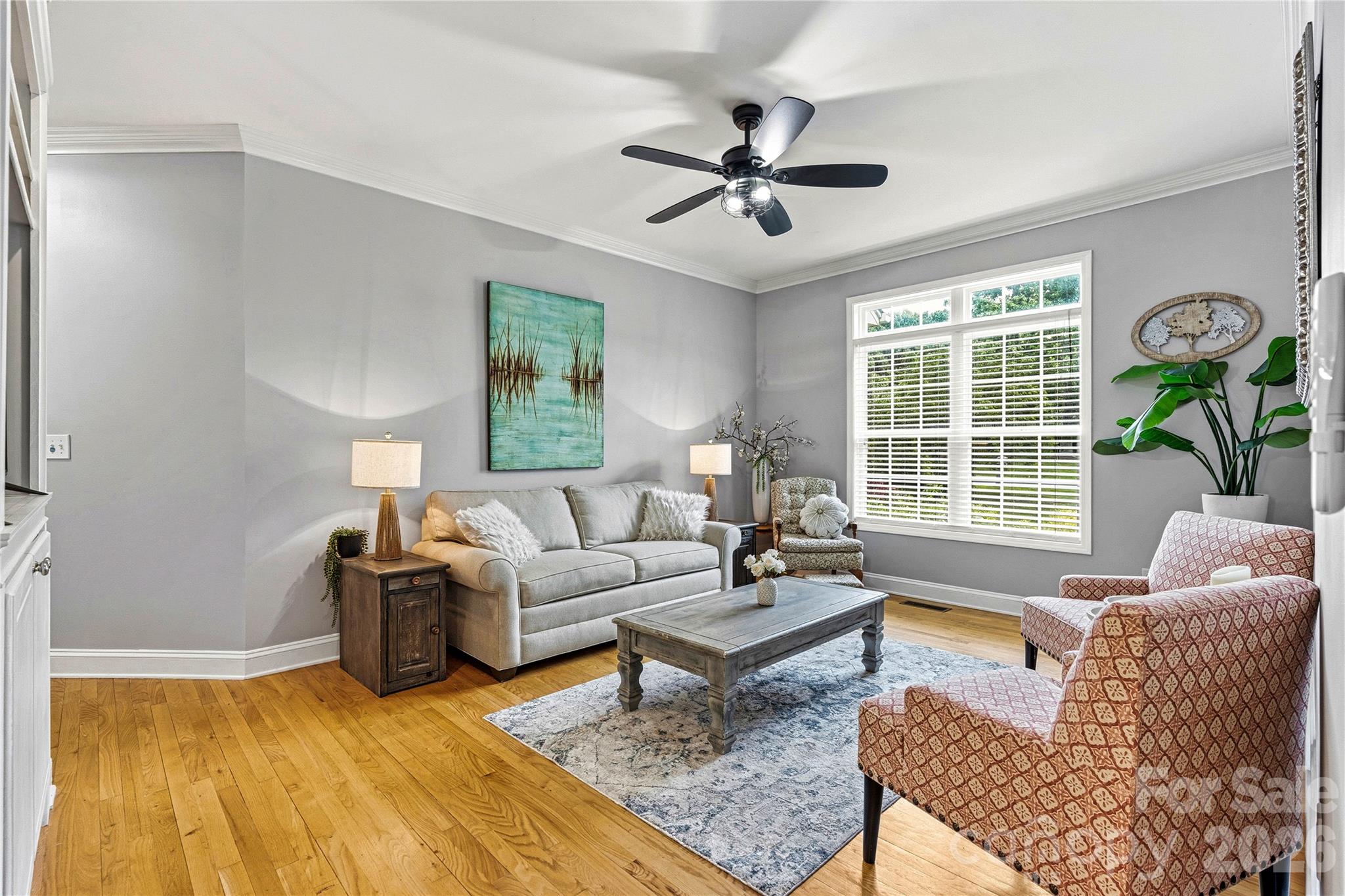 1606 High Ridge Drive Stanley, NC 28164 - Photo 15 of 44 a living room with furniture and a large window