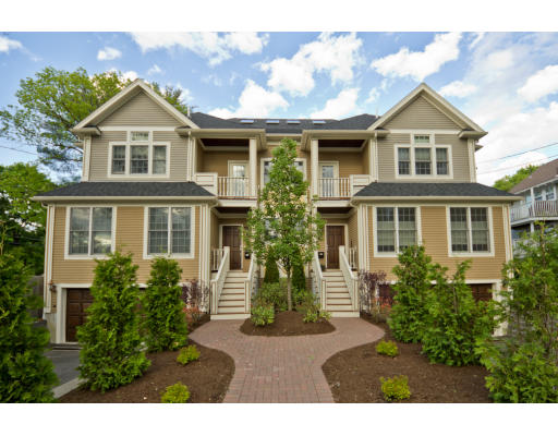 62 Withington Road, Unit 62 Newton, MA 02460 - Photo 1 of 1 a front view of a house with a yard