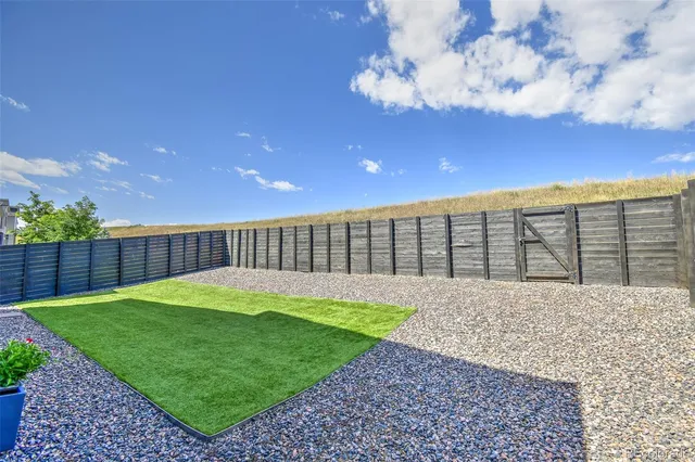 a view of a backyard with a garden