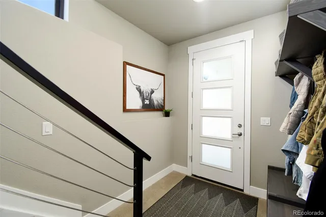 a bedroom with a bed and a desk