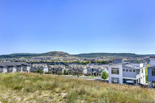 a view of a lake with a big yard