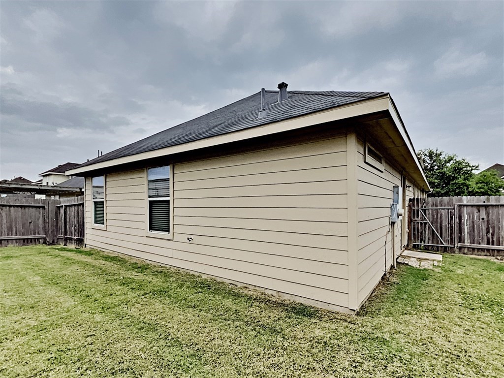 21535 Micheala Way Humble, TX 77338 - Photo 17 of 17 a view of a backyard