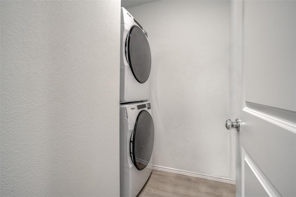 142 Sesame Lane Princeton, TX 75407 - Photo 11 of 15 a utility room with dryer and washer