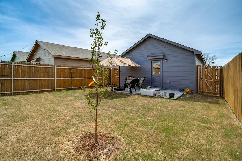 142 Sesame Lane Princeton, TX 75407 - Photo 15 of 15 a front view of a house with a yard