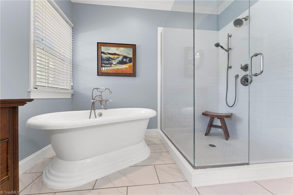 1044 Lasley Road Lewisville, NC 27023 - Photo 24 of 50 Spa-inspired primary bath designed for comfort and function