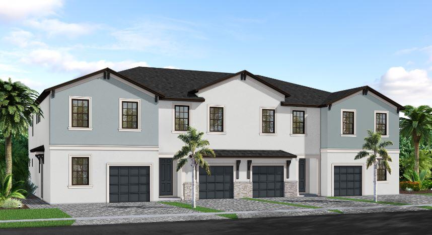 7790 Southwest Bentley Lane, Unit NAUTICAL 8015 Stuart, FL 34997 - Photo 1 of 22 a front view of a house with a yard