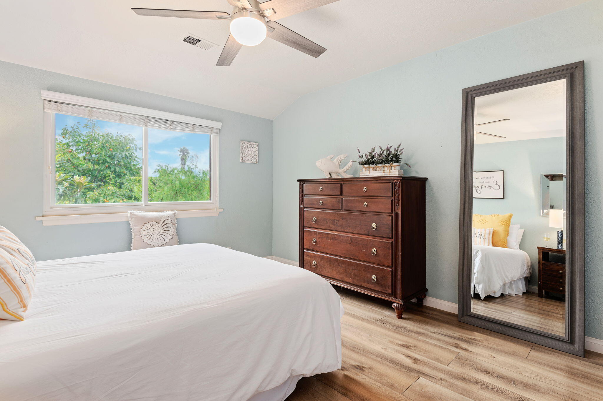 Undisclosed Address Santa Barbara, CA 93101 - Photo 16 of 23 a bedroom with a bed and a mirror on the dresser