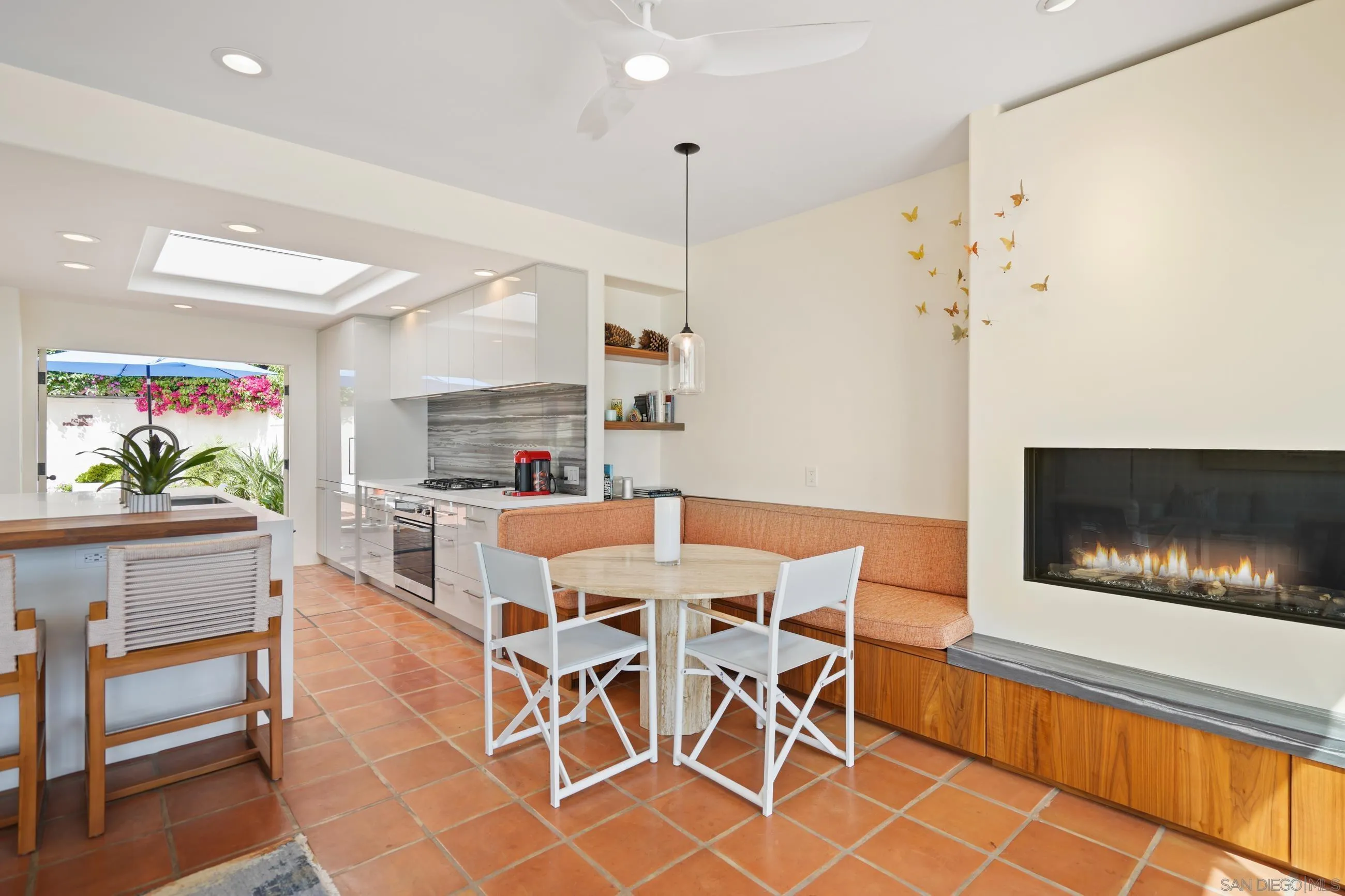 5650 Dolphin Place La Jolla, CA 92037 - Photo 18 of 54 a dining room with furniture and window
