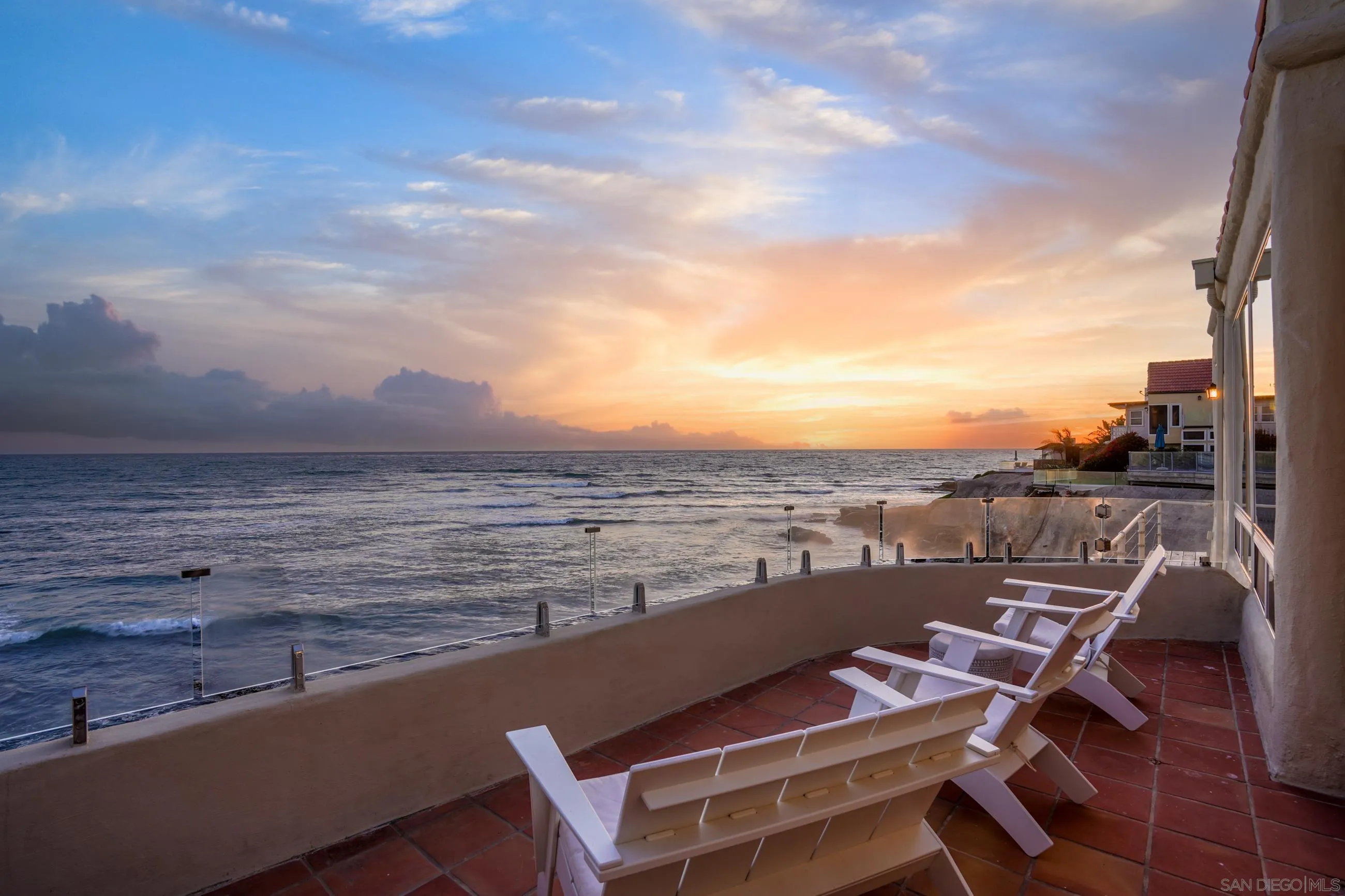 5650 Dolphin Place La Jolla, CA 92037 - Photo 3 of 54 a view of a balcony with an ocean view