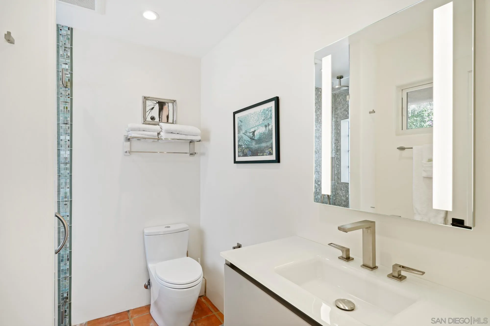 5650 Dolphin Place La Jolla, CA 92037 - Photo 39 of 54 a bathroom with a sink toilet and a mirror