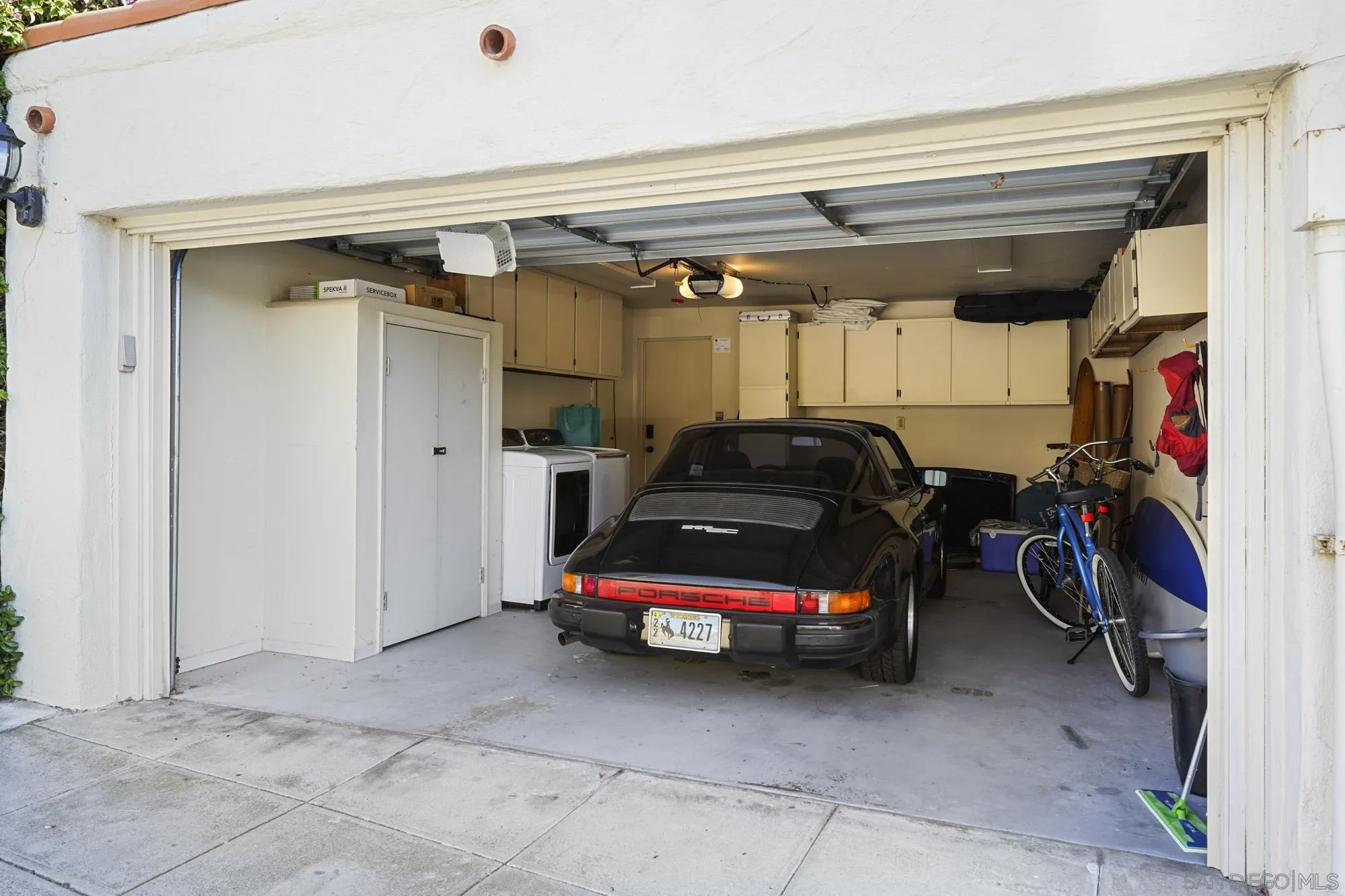 5650 Dolphin Place La Jolla, CA 92037 - Photo 54 of 54 a car parked in a garage