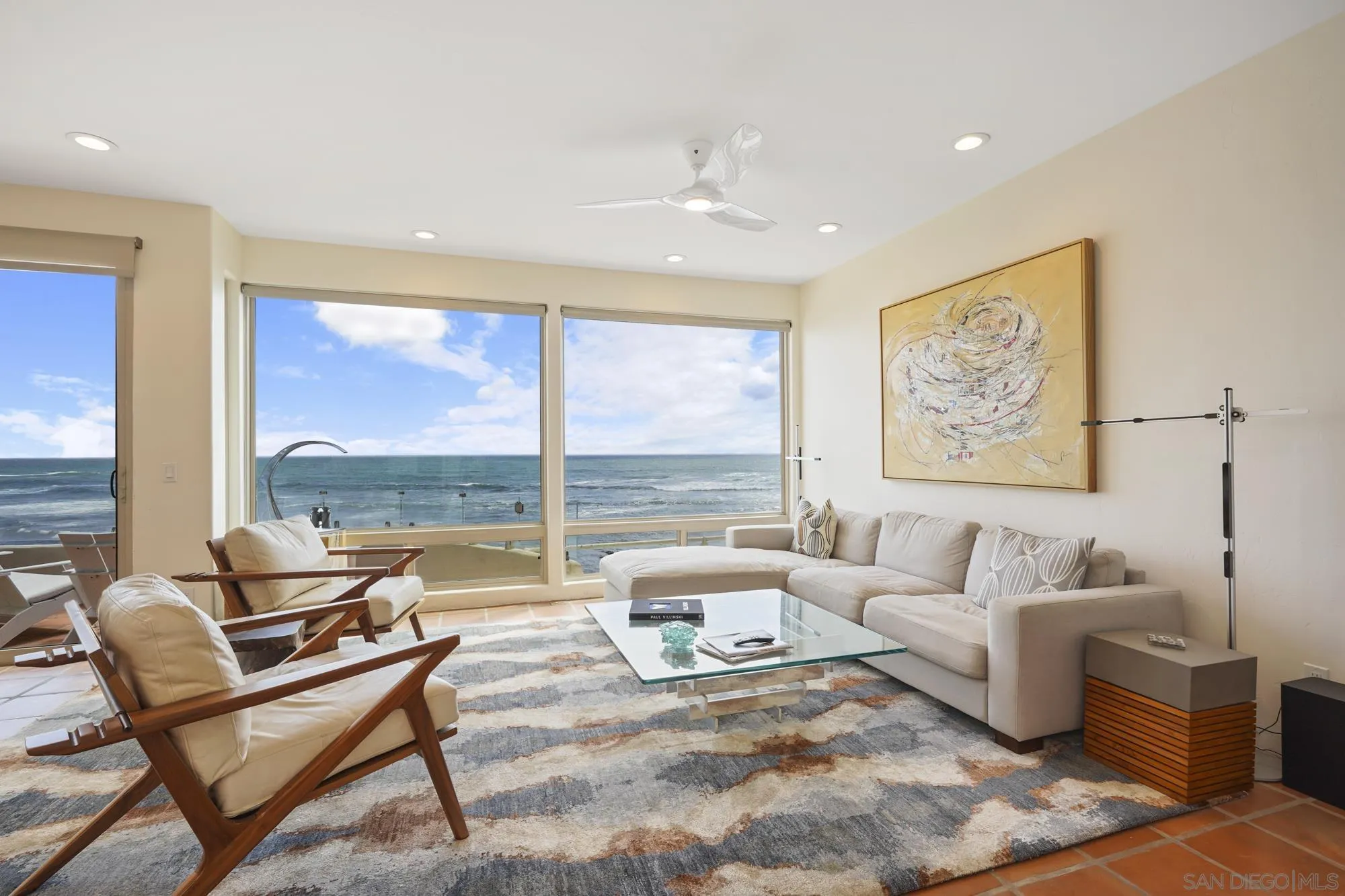 5650 Dolphin Place La Jolla, CA 92037 - Photo 7 of 54 a living room with furniture and a large window