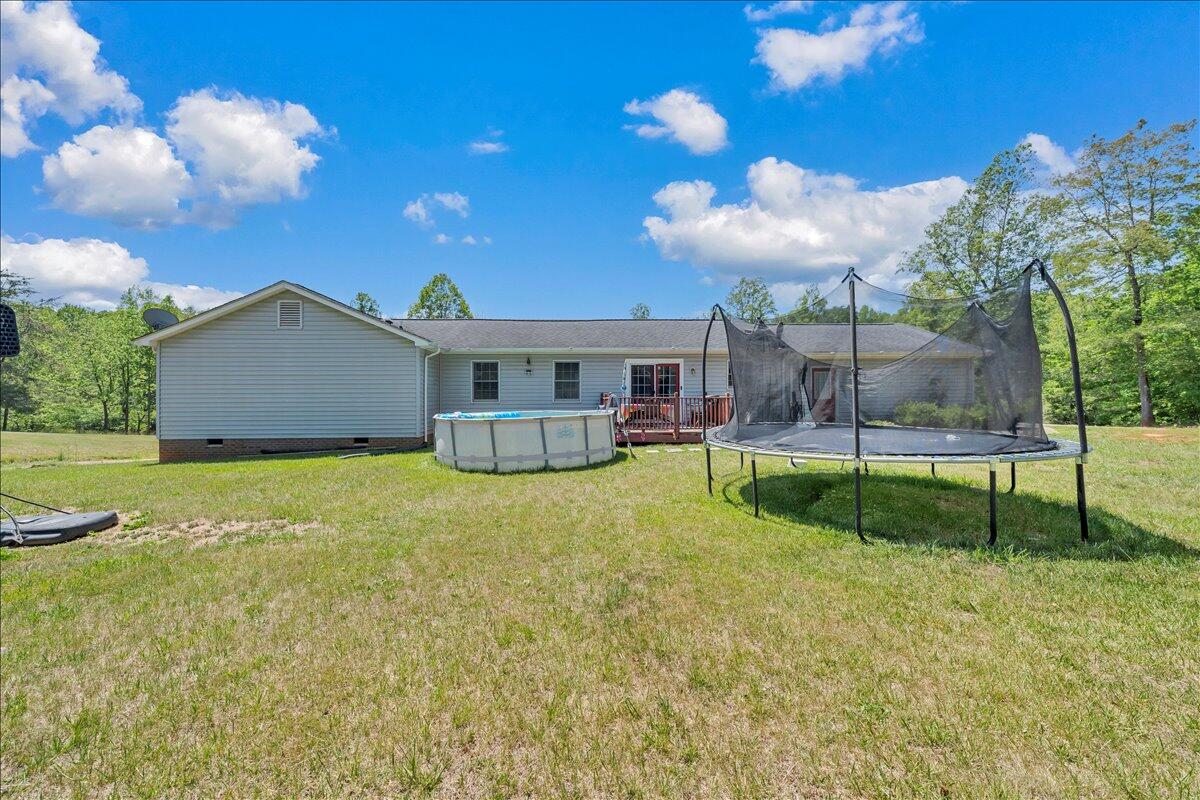 3870 Goose Dam Road Rocky Mount, VA 24151 - Photo 38 of 44 a view of an house with backyard and swimming pool
