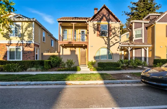 a view of multiple houses with a yard