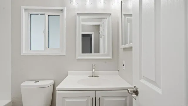 a bathroom with a sink and a toilet