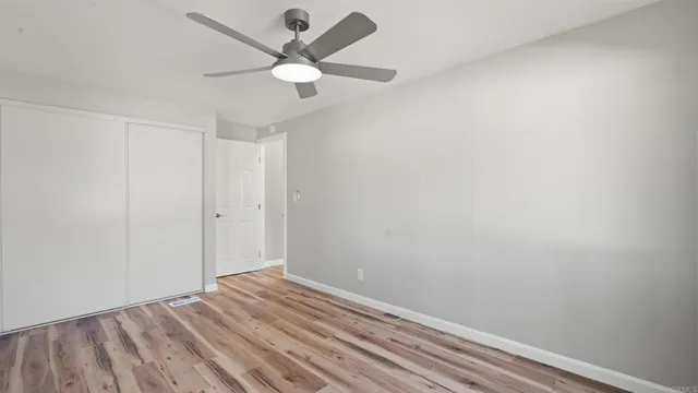 a view of a room with a fan