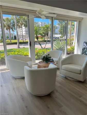 a living room with couch and a window