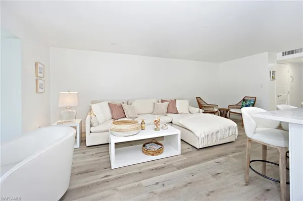 a bed room with a bed and a table