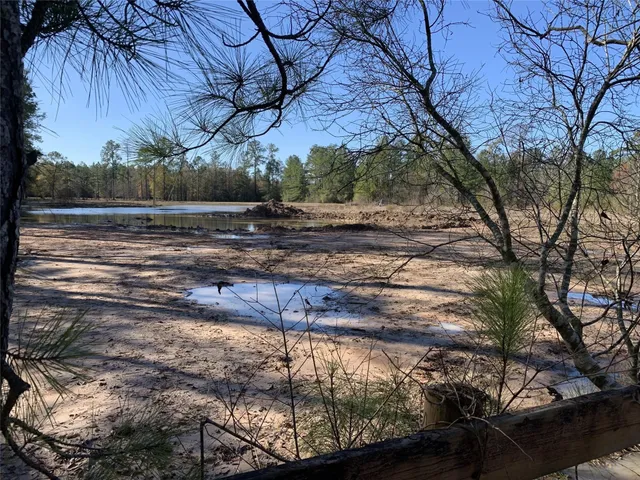 a view of a yard with an outdoor space