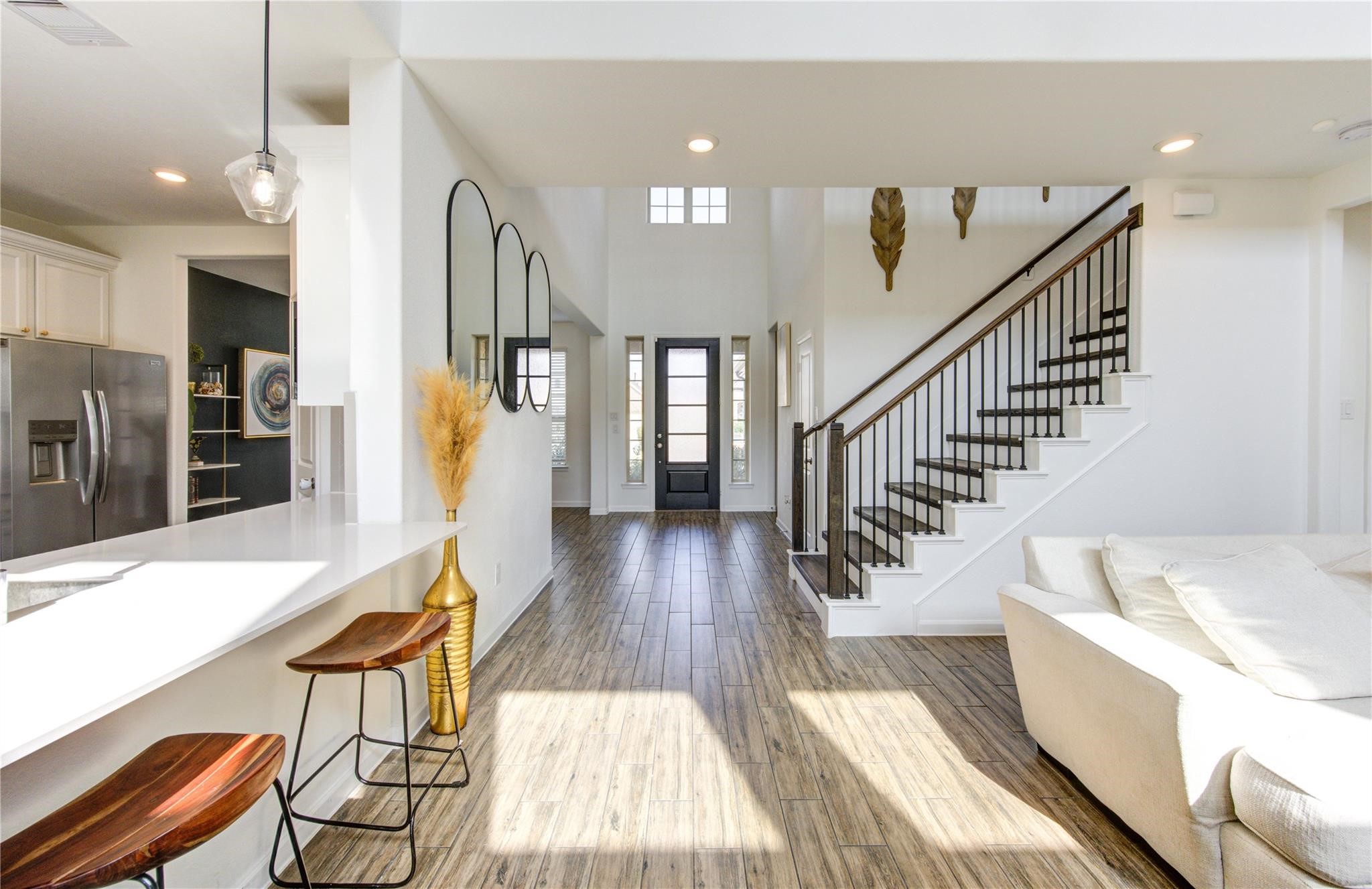17530 Sunset Skies Road Conroe, TX 77302 - Photo 13 of 47 a view of entryway and hall with wooden floor