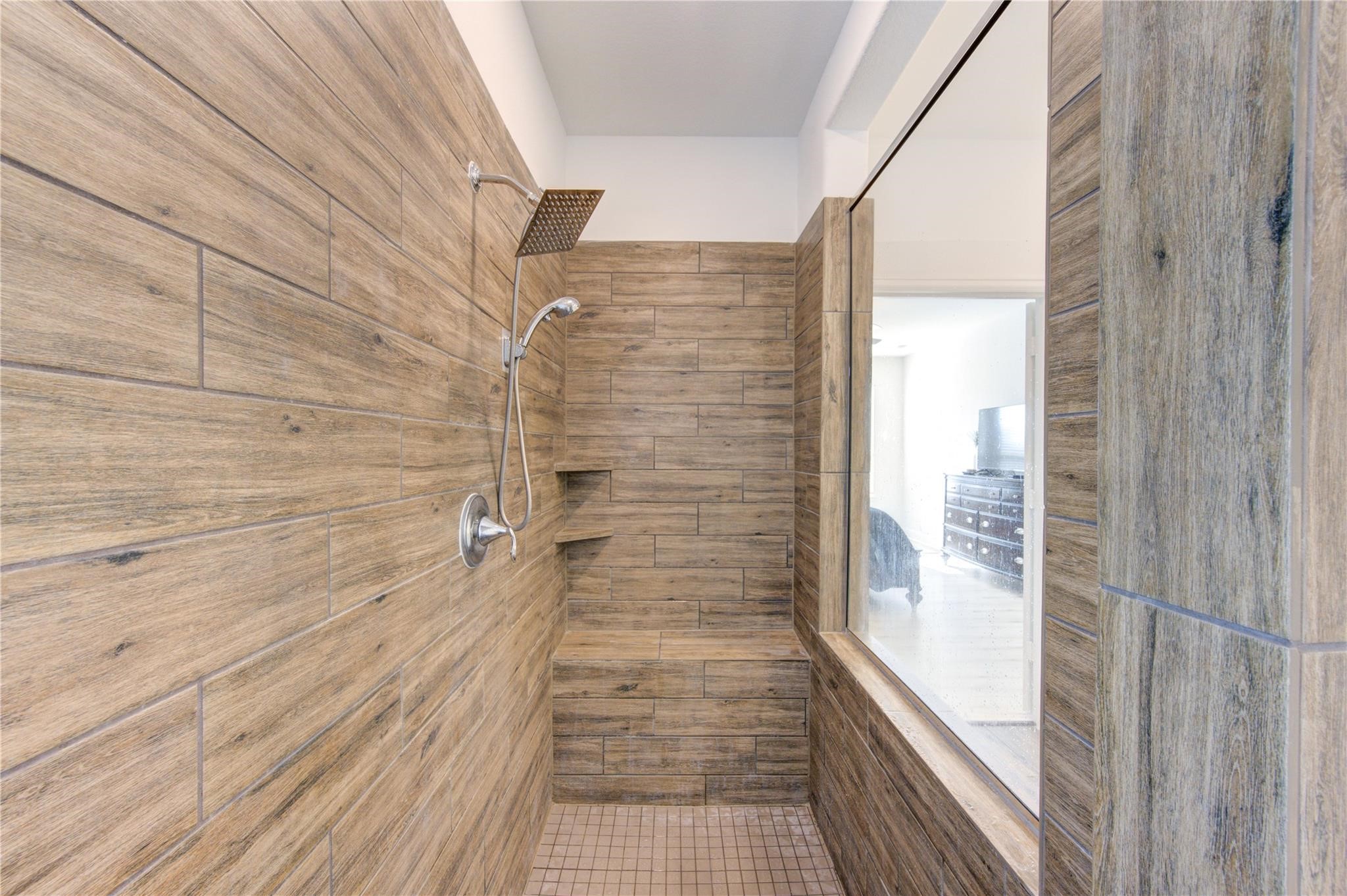 17530 Sunset Skies Road Conroe, TX 77302 - Photo 26 of 47 a bathroom with a shower