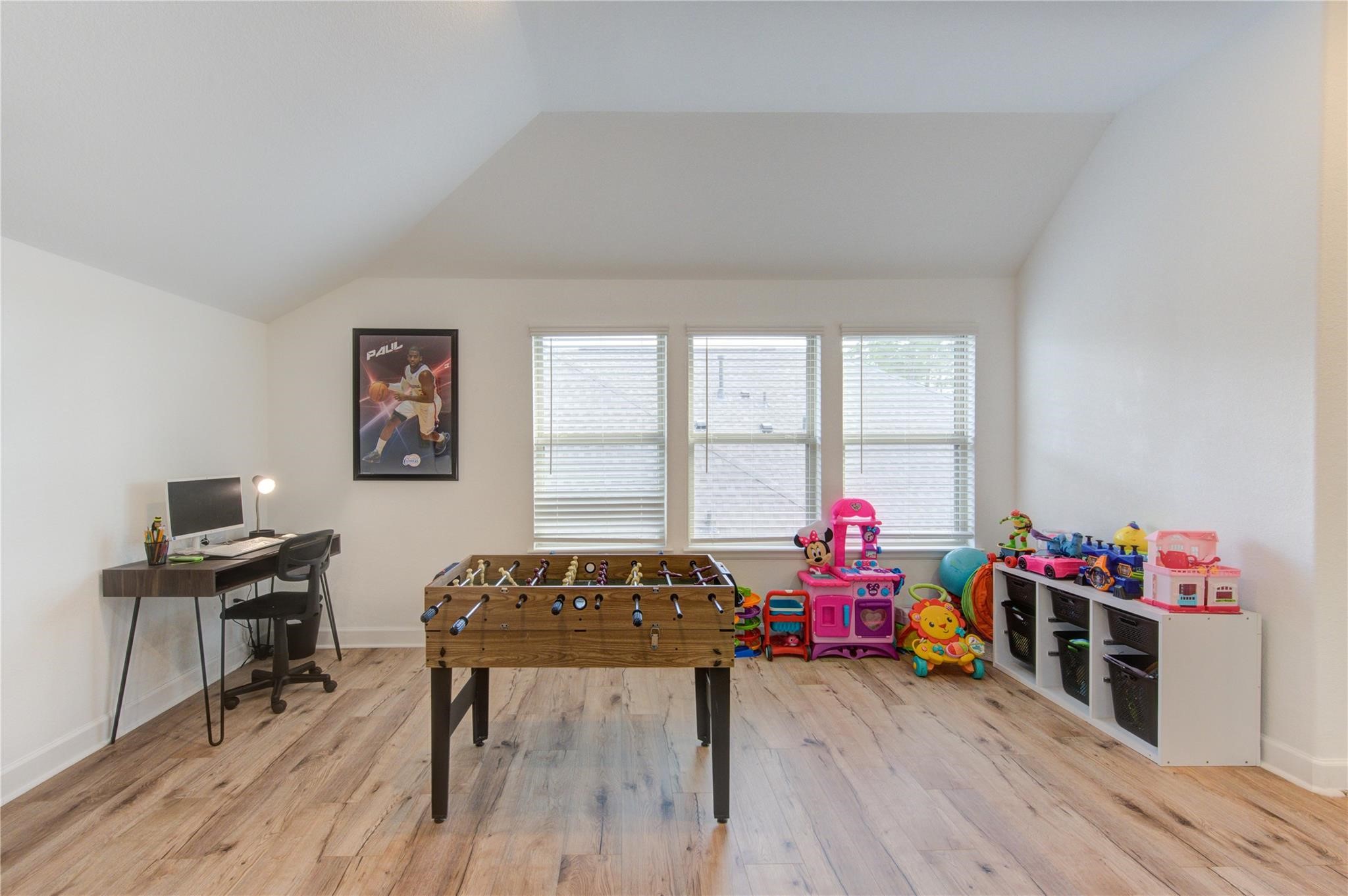 17530 Sunset Skies Road Conroe, TX 77302 - Photo 32 of 47 a living room with furniture and wooden floor