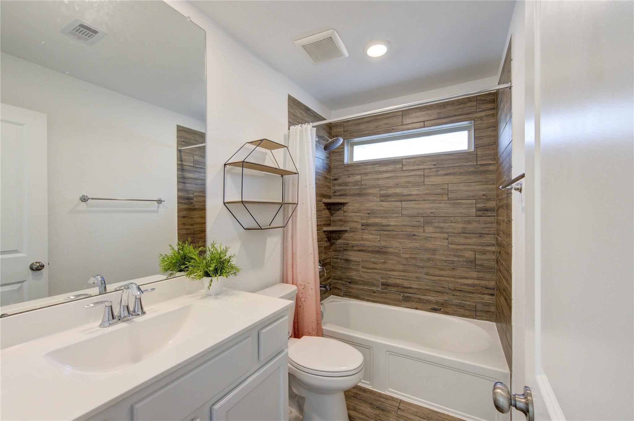 17530 Sunset Skies Road Conroe, TX 77302 - Photo 37 of 47 a bathroom with a sink toilet and shower