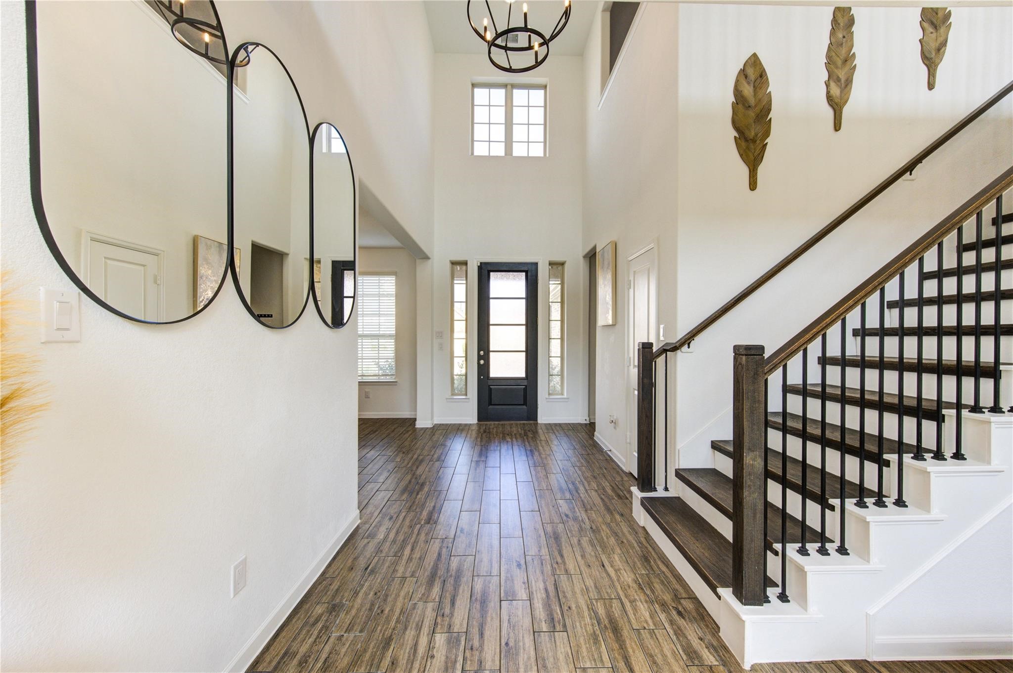 17530 Sunset Skies Road Conroe, TX 77302 - Photo 7 of 47 a view of an entryway with wooden floor