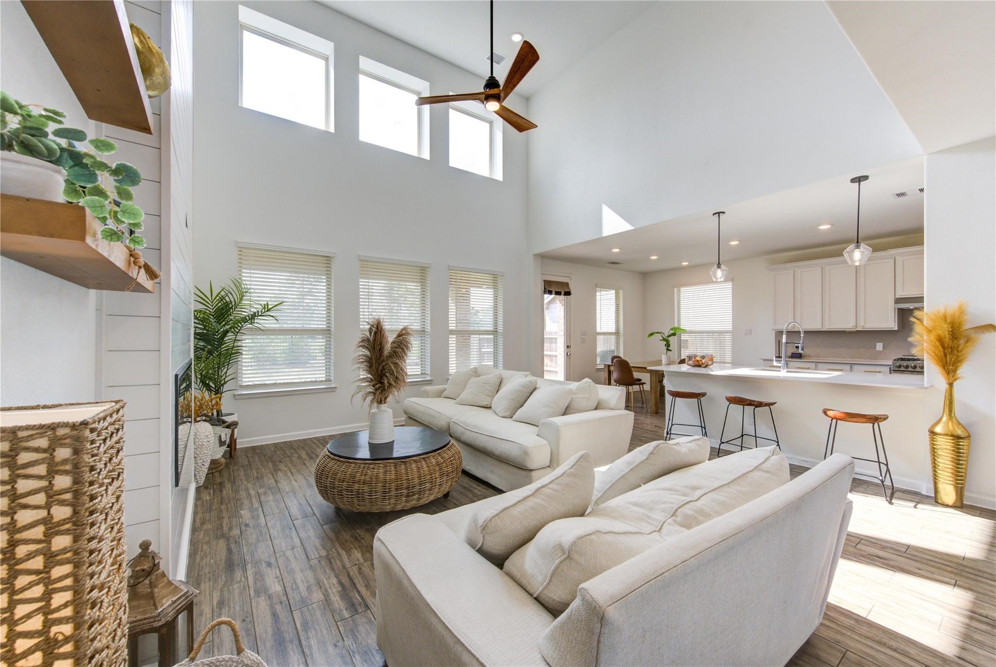 17530 Sunset Skies Road Conroe, TX 77302 - Photo 9 of 47 a living room with fireplace furniture and a wooden floor