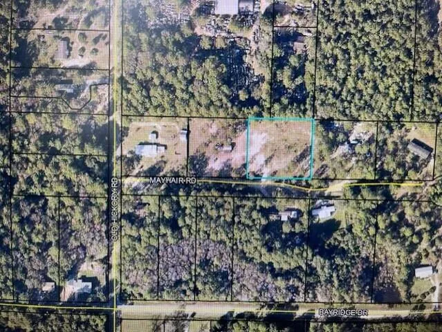 a backyard of a house and a garden