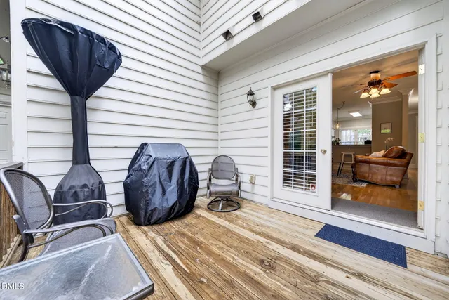 a front view of a house with a yard and a garage