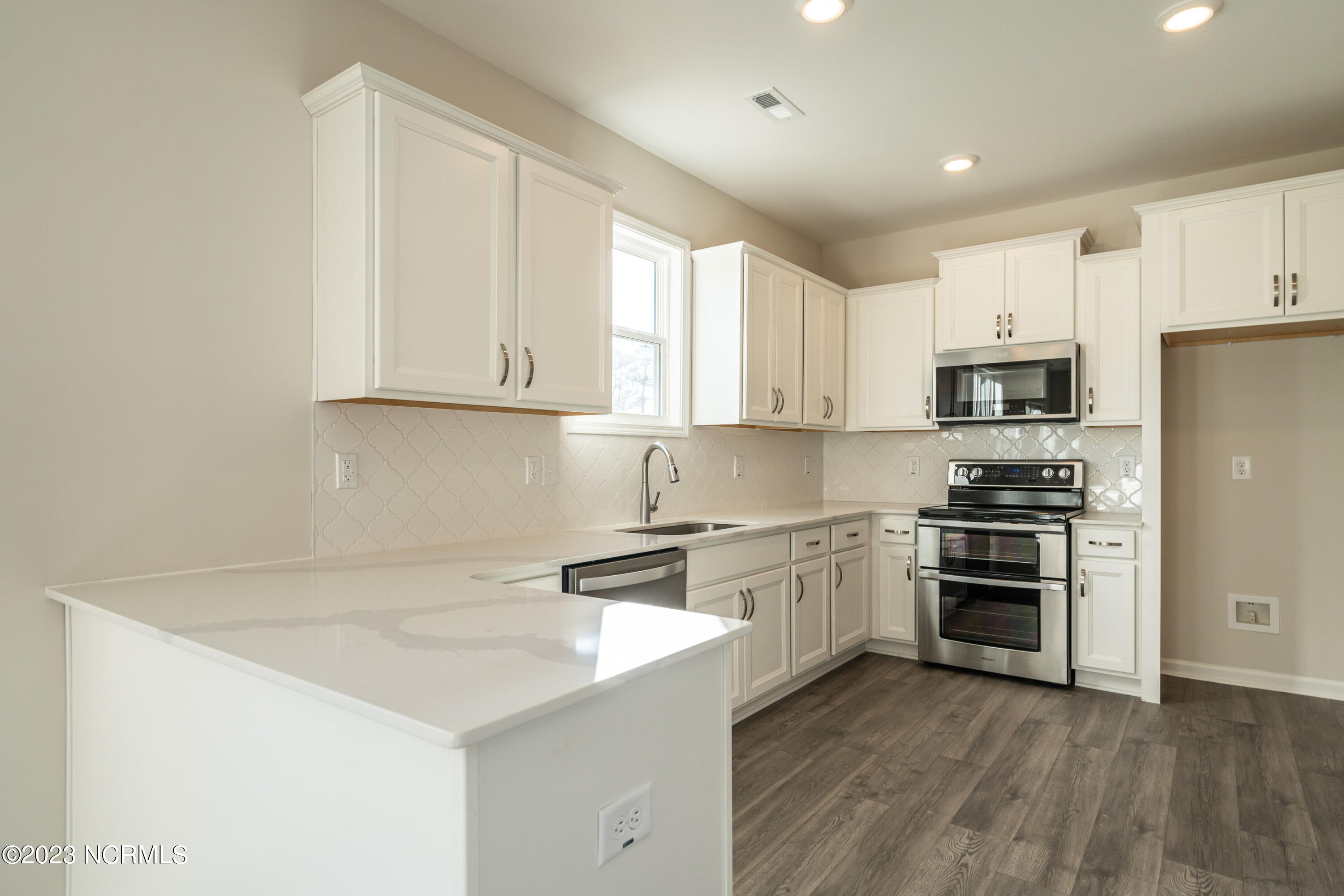 8807 Colbert Pl Drive Leland, NC 28451 - Photo 16 of 32 018-original-kitchen