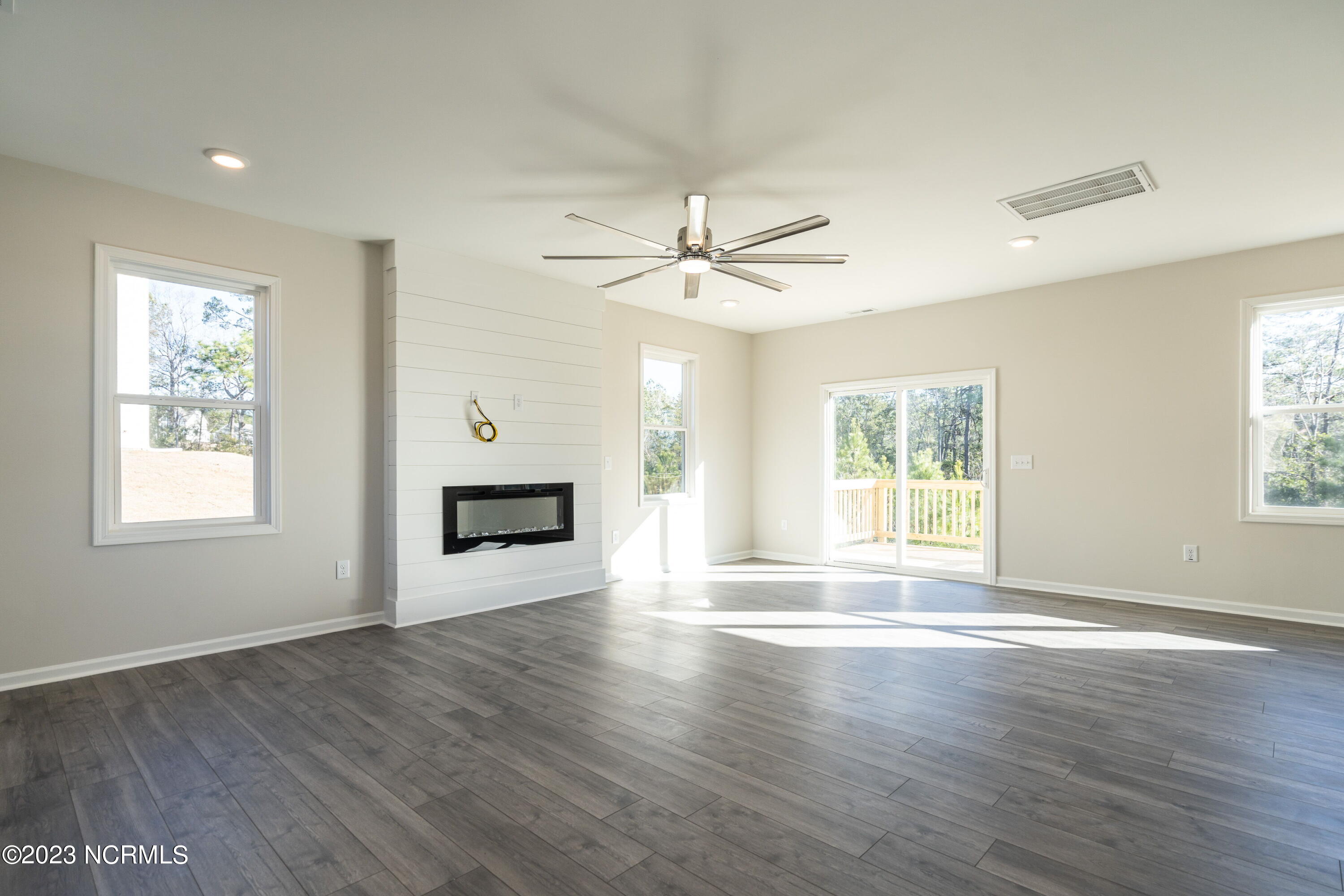 8807 Colbert Pl Drive Leland, NC 28451 - Photo 5 of 32 006-original-living-room
