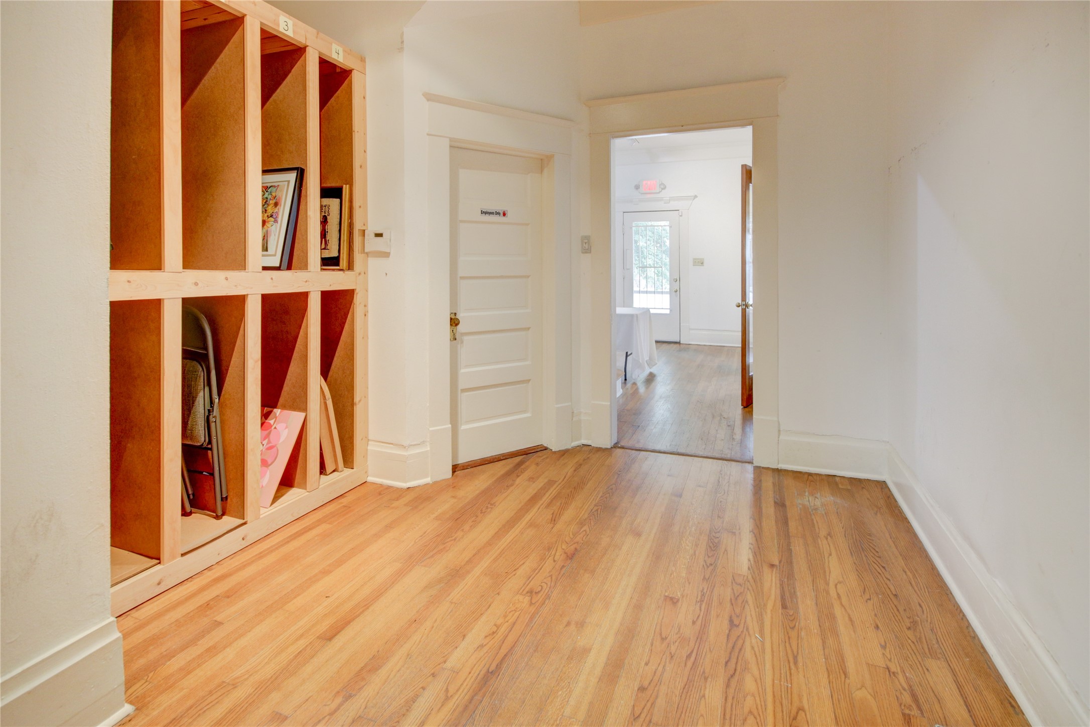 239 Westheimer Road Houston, TX 77006 - Photo 16 of 50 view of wooden floor and windows in a room