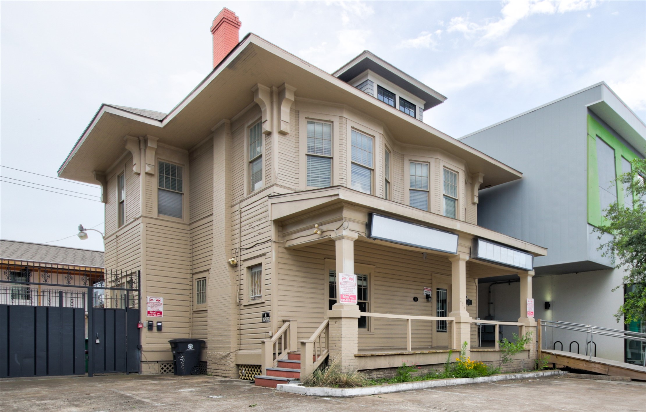239 Westheimer Road Houston, TX 77006 - Photo 4 of 50 a front view of a house with garage