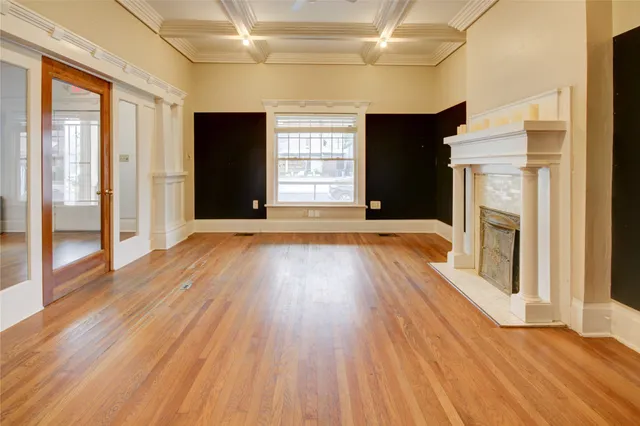 a view of a livingroom with wooden floor
