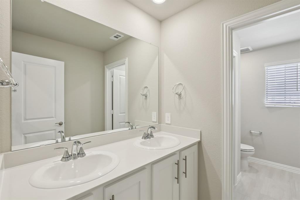 1859 Gallop Road Seagoville, TX 75159 - Photo 16 of 30 Photo is not of the actual home, but is an inspirational photo of builder’s model home and may depict options, furnishings, and/or decorator features that are not included.