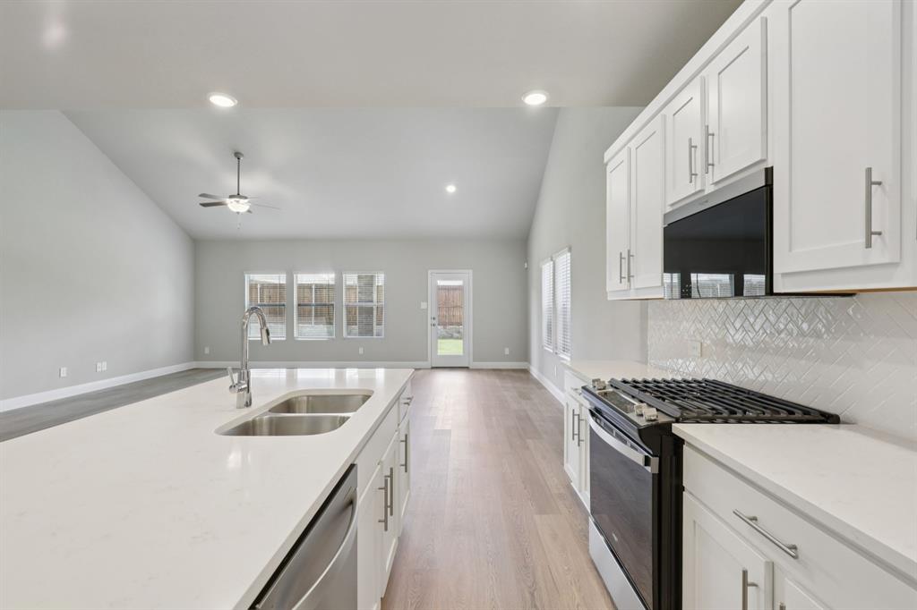 1859 Gallop Road Seagoville, TX 75159 - Photo 4 of 30 Photo is not of the actual home, but is an inspirational photo of builder’s model home and may depict options, furnishings, and/or decorator features that are not included.