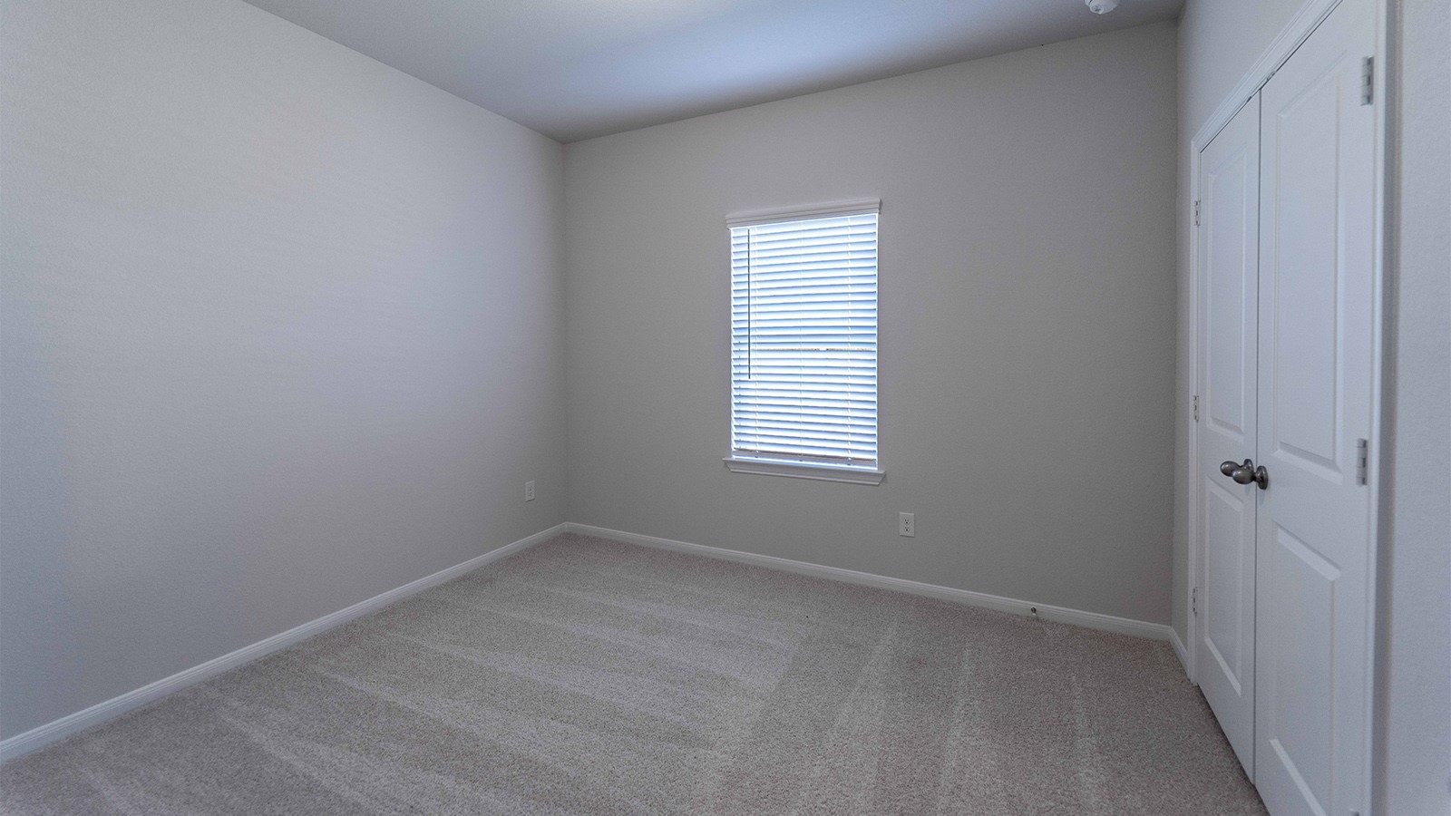 1539 Windrose Bend Angleton, TX 77515 - Photo 13 of 13 a view of an empty room with a window
